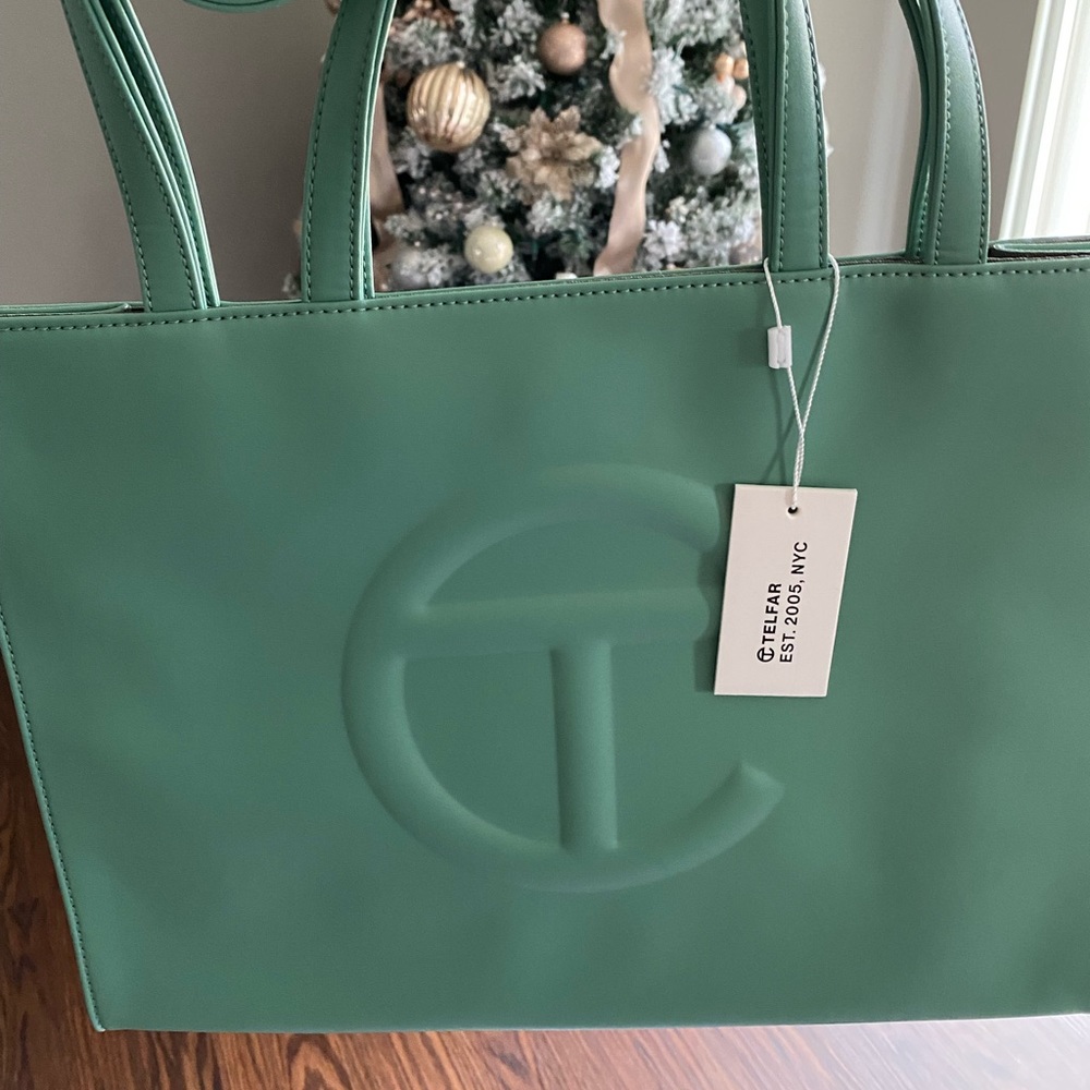 Telfar medium shopping bag. NEVER USED *proof of purchase included in photos*
